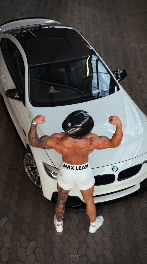 Back double-biceps over the M4 hood, MAX LEAN waistband