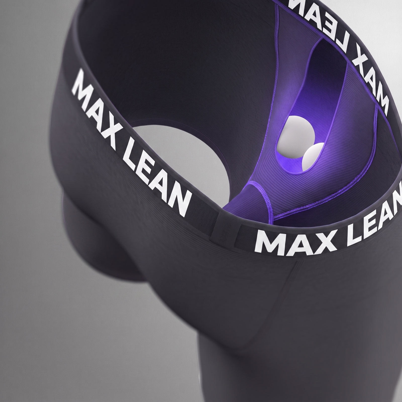 View into the trunk from above: the separate MAX LEAN Support Pouch chamber sewn to the inside of the front panel, highlighted in violet